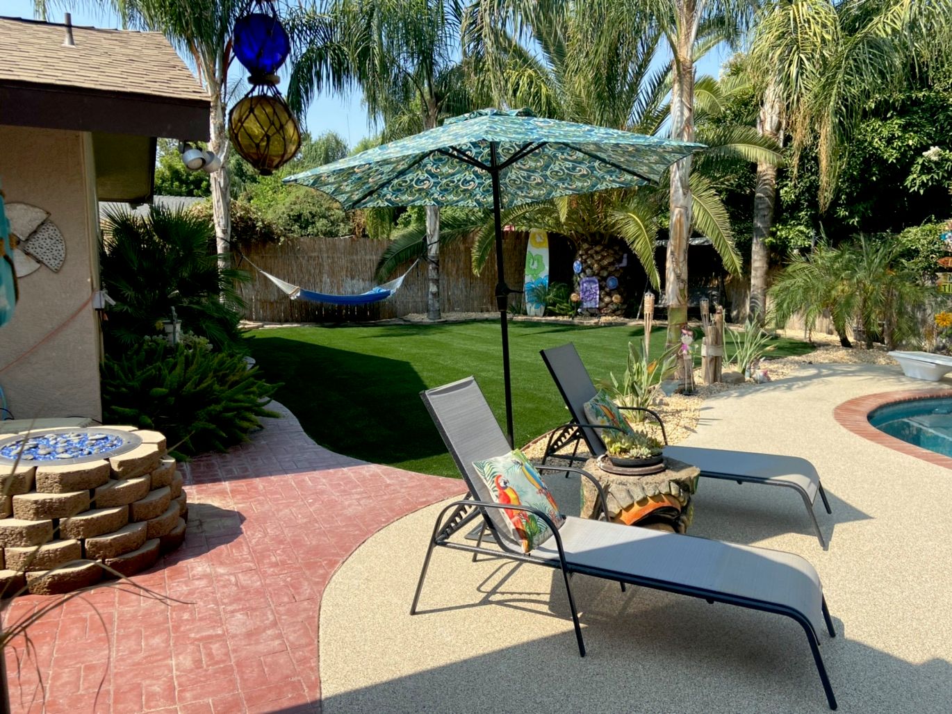 Backyard astroturf with pool